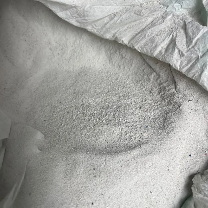 White pulverised PVC pipe powder in an open bag