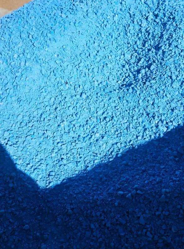 Pile of blue PVC pipe regrind