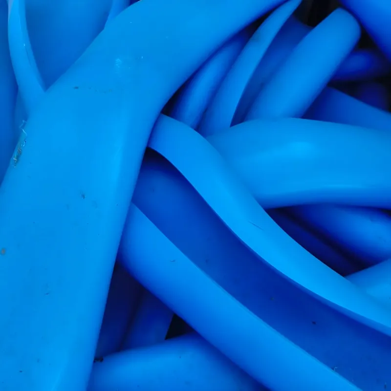 Blue PVC pipe purges, close-up