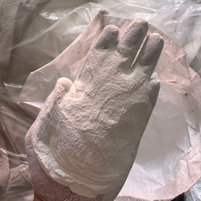 White Westlake off-grade PVC resin powder on an open hand